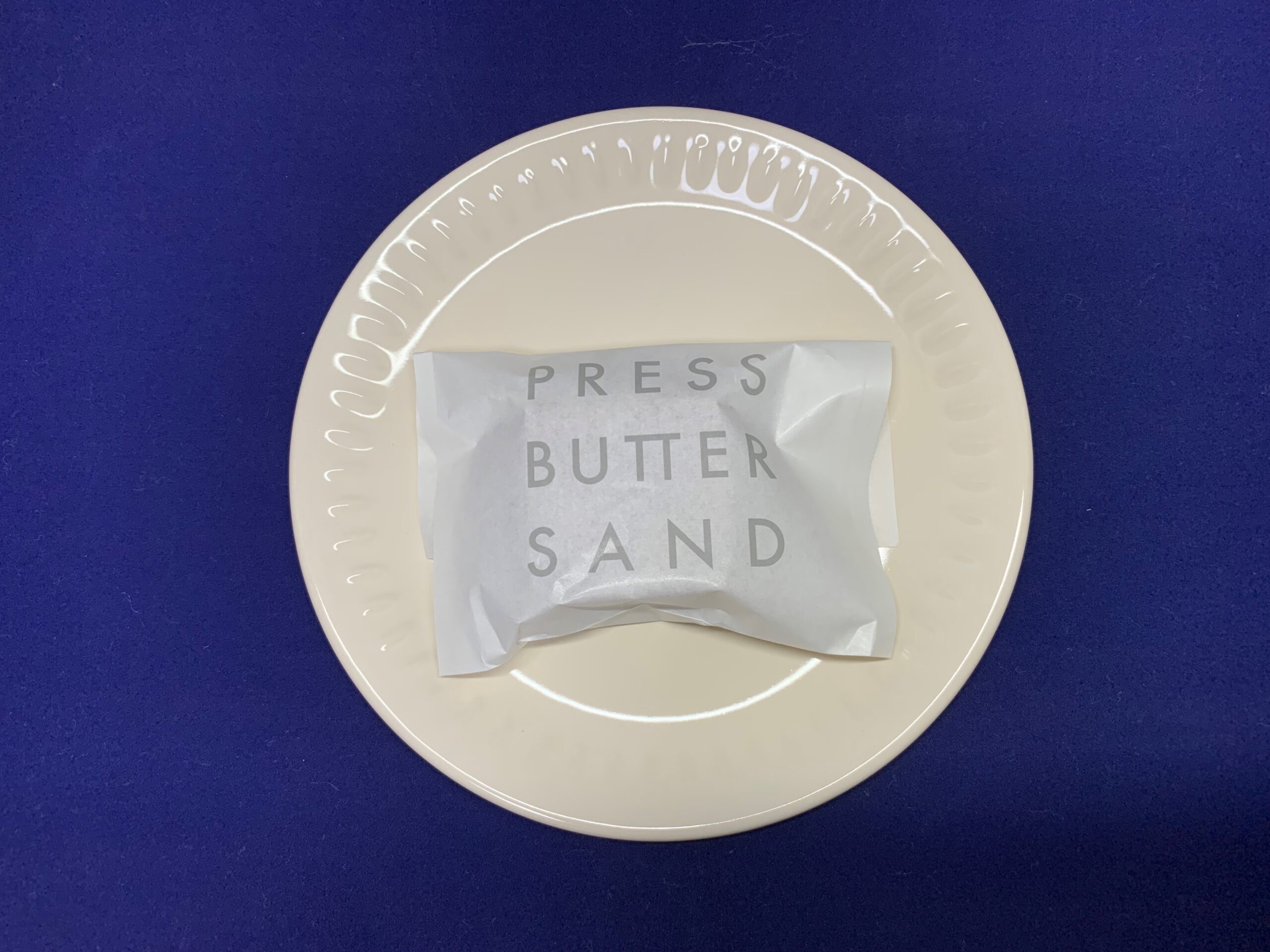 PRESS BUTTER SAND